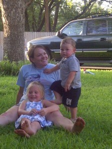 Mama, Merritt and Caleb in the grass